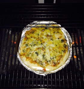 Pizza on the grill. Yes, you can! 